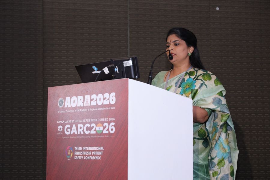Dr. Kalpana K speaking at AORA 2026, the 16th Annual Conference of the Academy of Regional Anaesthesia of India
